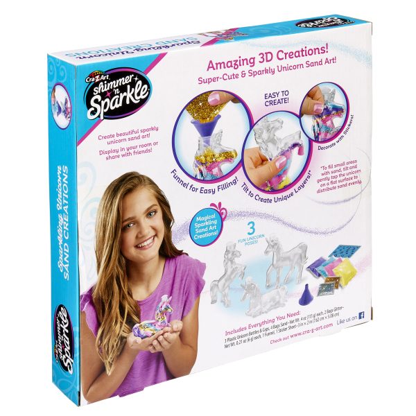 A box of Shimmer 'n Sparkle Sparkling Unicorn Sand Art Creations featuring unicorn-shaped molds, tools, and sand for creating colorful art. The packaging shows a girl holding a finished unicorn sand art creation.