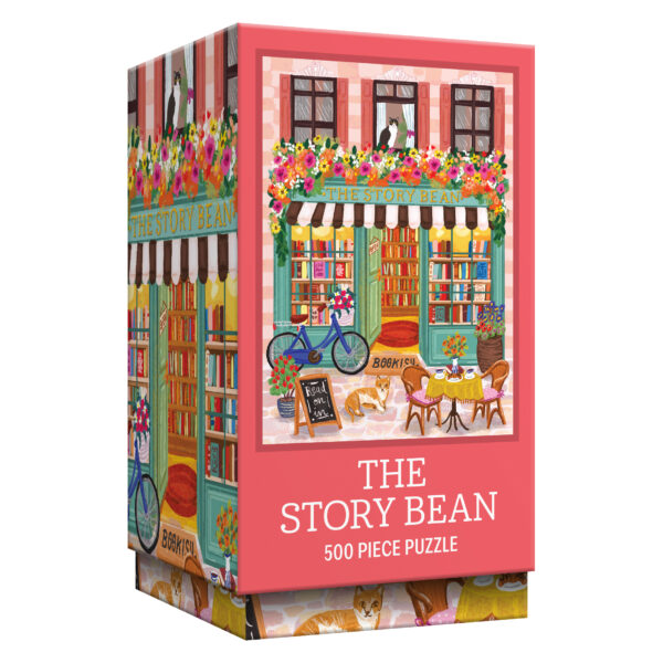 The ROSEART VERTICAL VISIONS "The Story Bean" 500 piece jigsaw puzzle features an illustrated bookstore café with flowers, a bicycle, books, and outdoor seating.