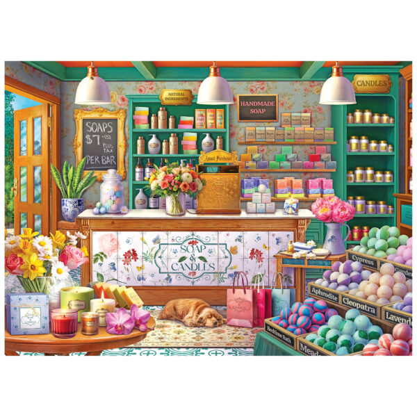 A vibrant soap and candle shop with shelves of soaps, bath bombs, candles, flowers, gift bags, and a dog behind the counter—like the scene in ROSEART-KODAK PREMIUM-SOAP & CANDLE SHOP-1000 PIECE JIGSAW PUZZLE.